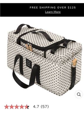 Petunia Pickle Bottom Cream Travel Duffle with Black Cross Pattern